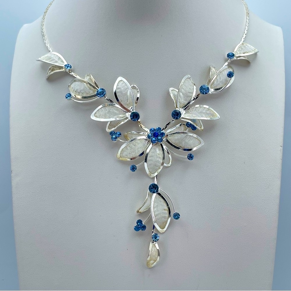 Beautiful Silver Floral Statement Necklace with Bright Blue Crystals Y Drop